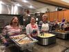 Turkey, mashed potatoes, stuffing and more are prepared to be served to veterans and guests at the American Legion Veterans Dinner. Photo by Linda Bauers.